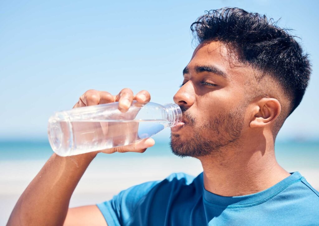 Shot Of A Man Drinking Water While Out For A Run O 2023 11 27 05 18 18 Utc - Aqua Plus