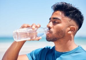 Shot Of A Man Drinking Water While Out For A Run O 2023 11 27 05 18 18 Utc - Aqua Plus
